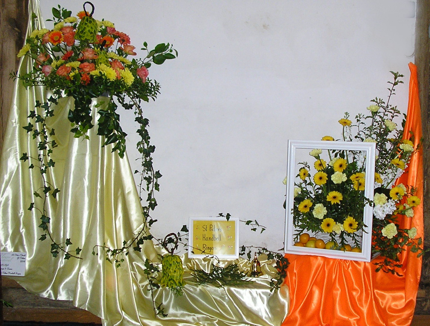 Handbell ringers floral display 'Oranges and Lemons'